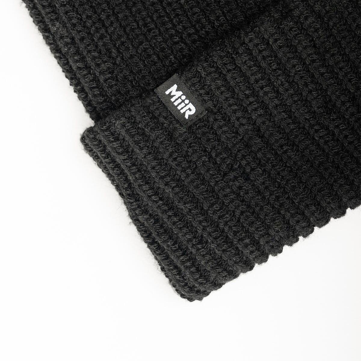 recycled-poly-rib-beanie-s5 WebPDP-RecycledPolyRibBeanie_Studio_TagDetail_Black__BNE002002OS.jpg